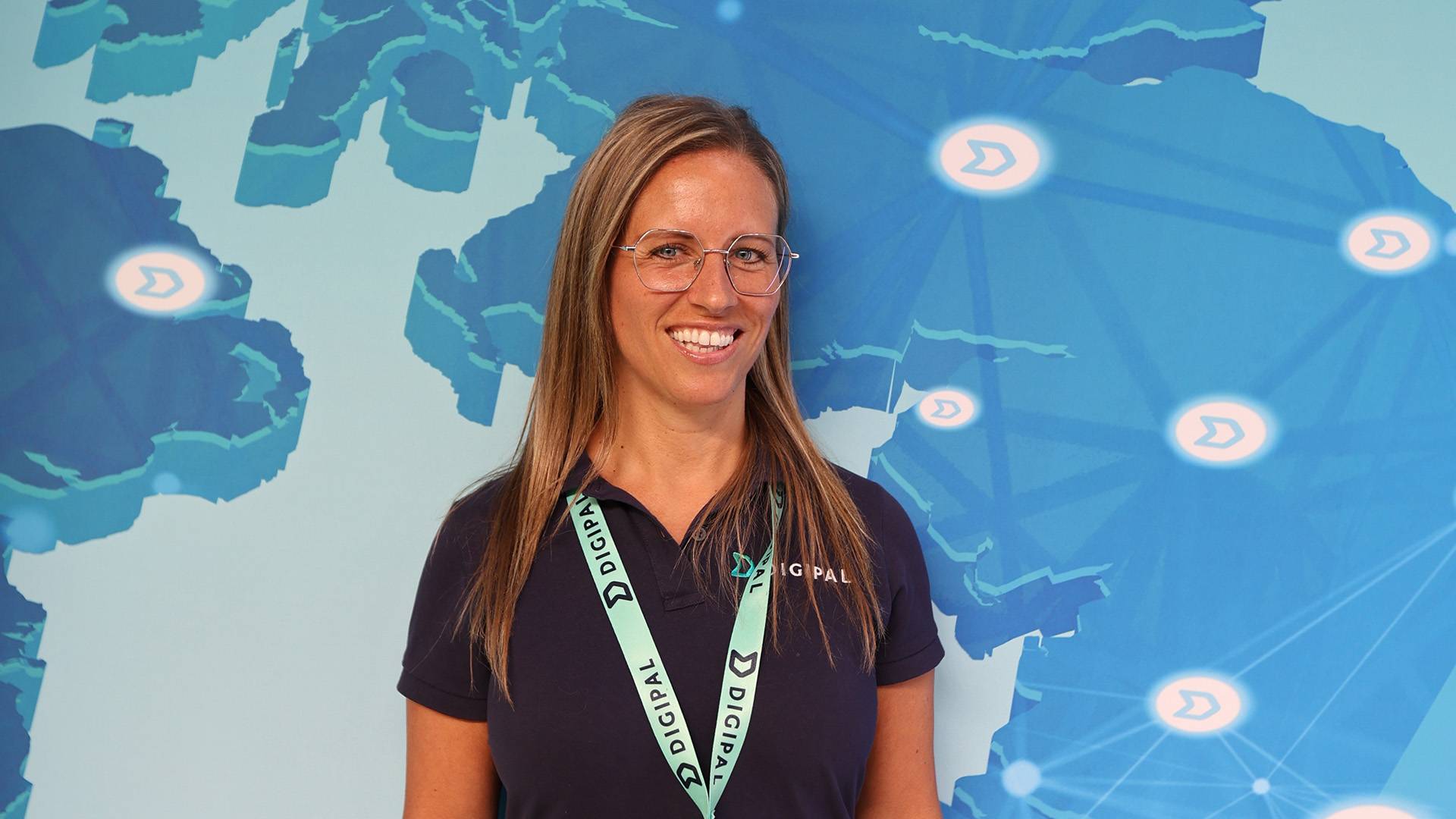 Digipal's new team member, Natalie, smiles at a logistics event.